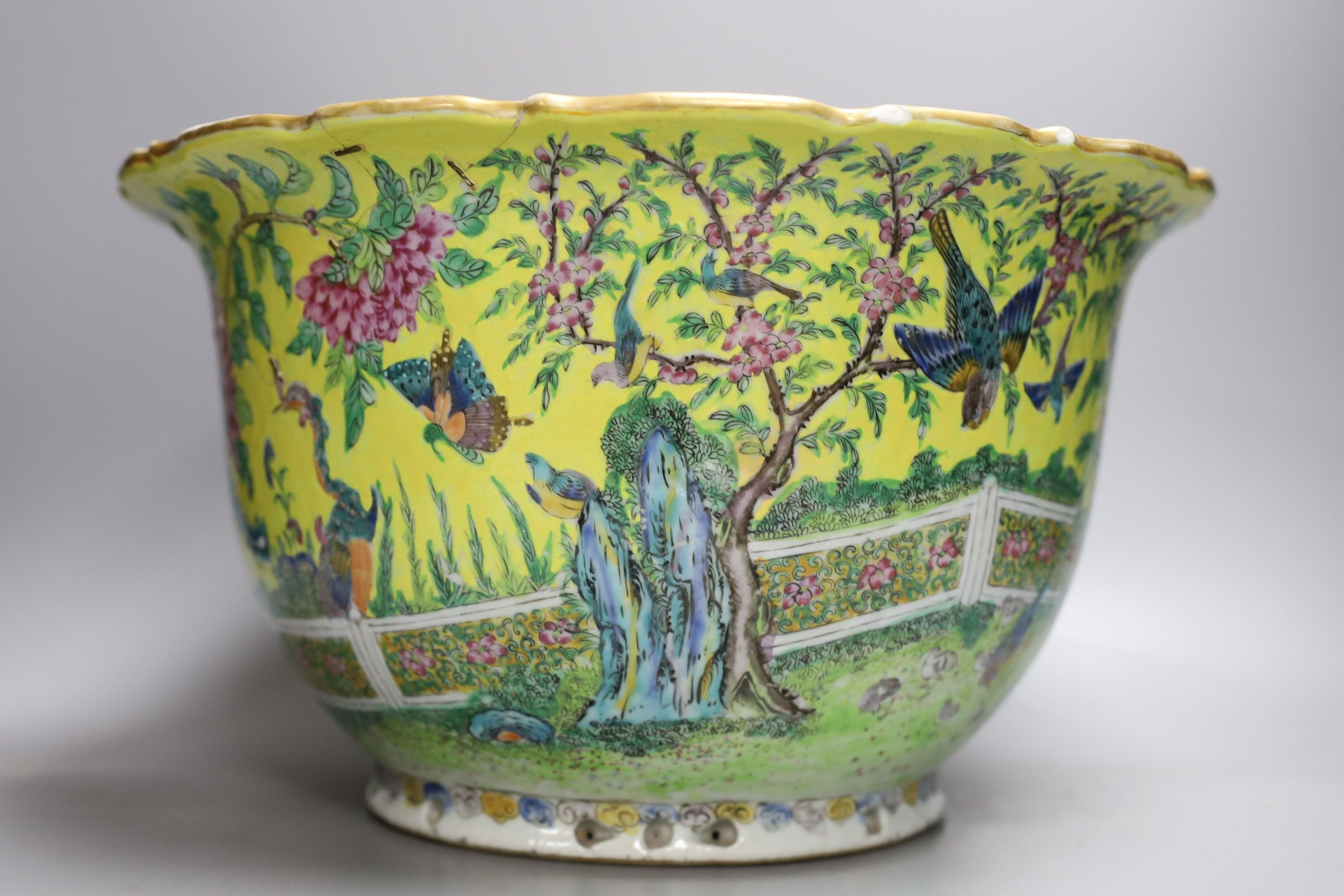 A Chinese yellow ground flower pot, early 20th century, 38cm diameter
